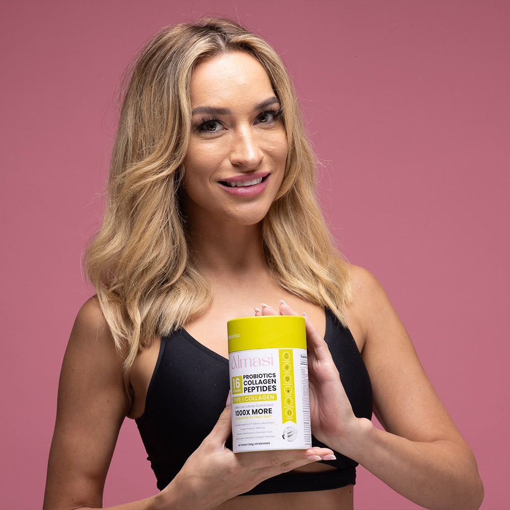 woman holding Almasi Probiotics Collagen Powder container for skin health and beauty