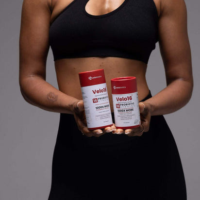 Bottle of Velo16 Probiotic Capsules with label highlighting 16 strains and digestive health benefits